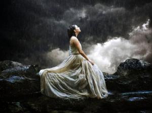 woman sitting in the rain